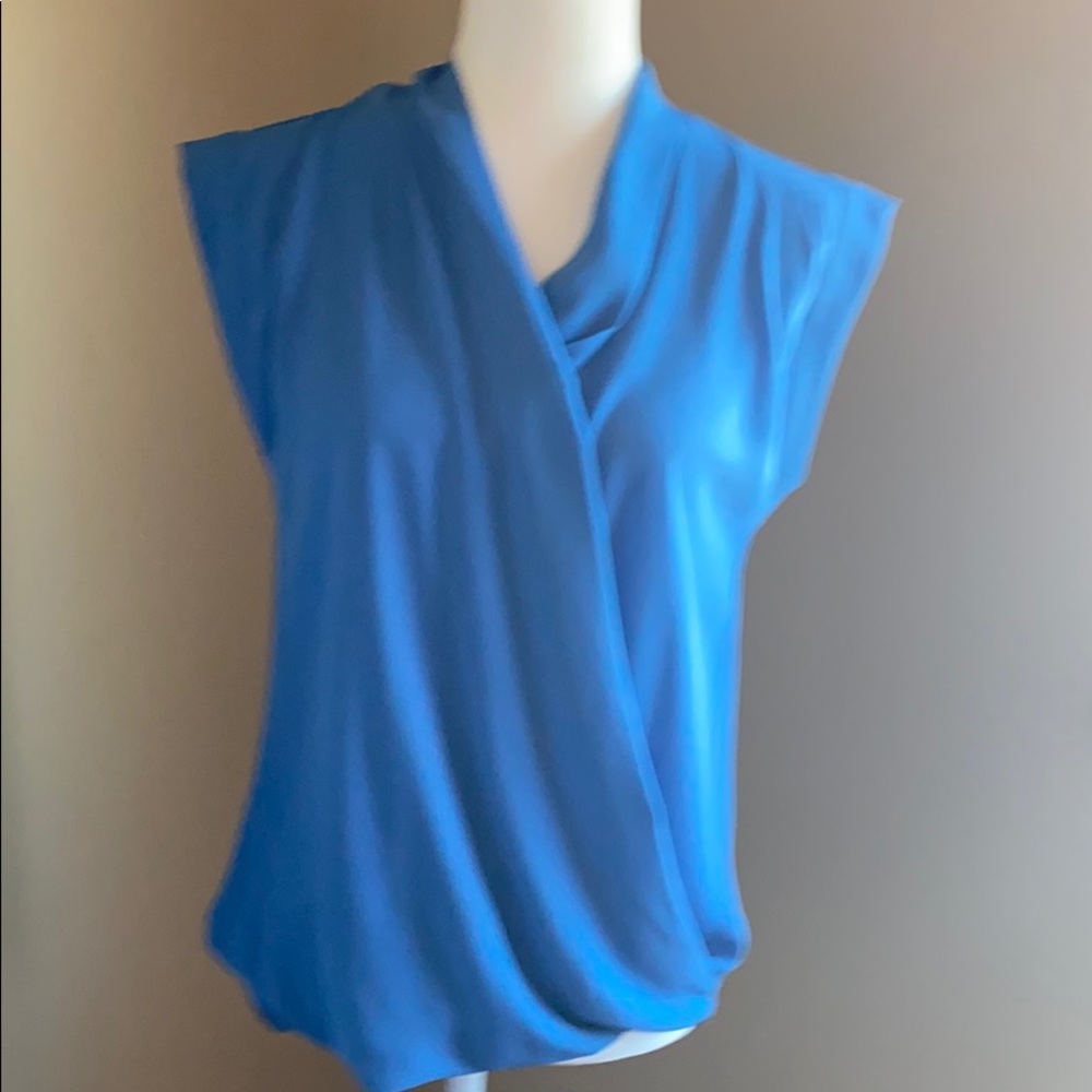 Blue sleeveless wrap blouse